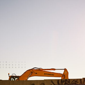 Bentleigh #1 fine art print, fomr the series The Hum of industry. Excavator in urban setting at sunset