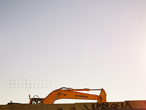 Bentleigh #1 fine art print, fomr the series The Hum of industry. Excavator in urban setting at sunset