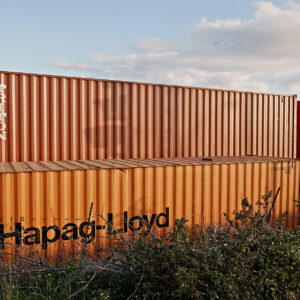 Kensington #2 fine art print, from the series The Hum of industry. Shipping containers in late sun